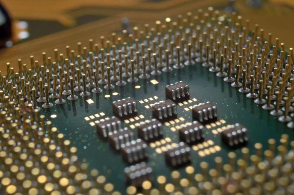 cpu-socket-pins-motherboard-microprocessor.jpg cpu-socket-pins-motherboard-microprocessor