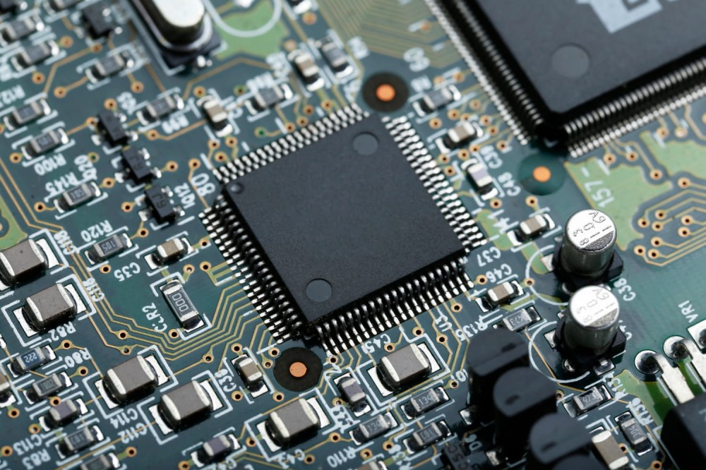 integrated-circuit-ic-chip-on-pcb-board.jpg integrated-circuit-ic-chip-on-pcb-board